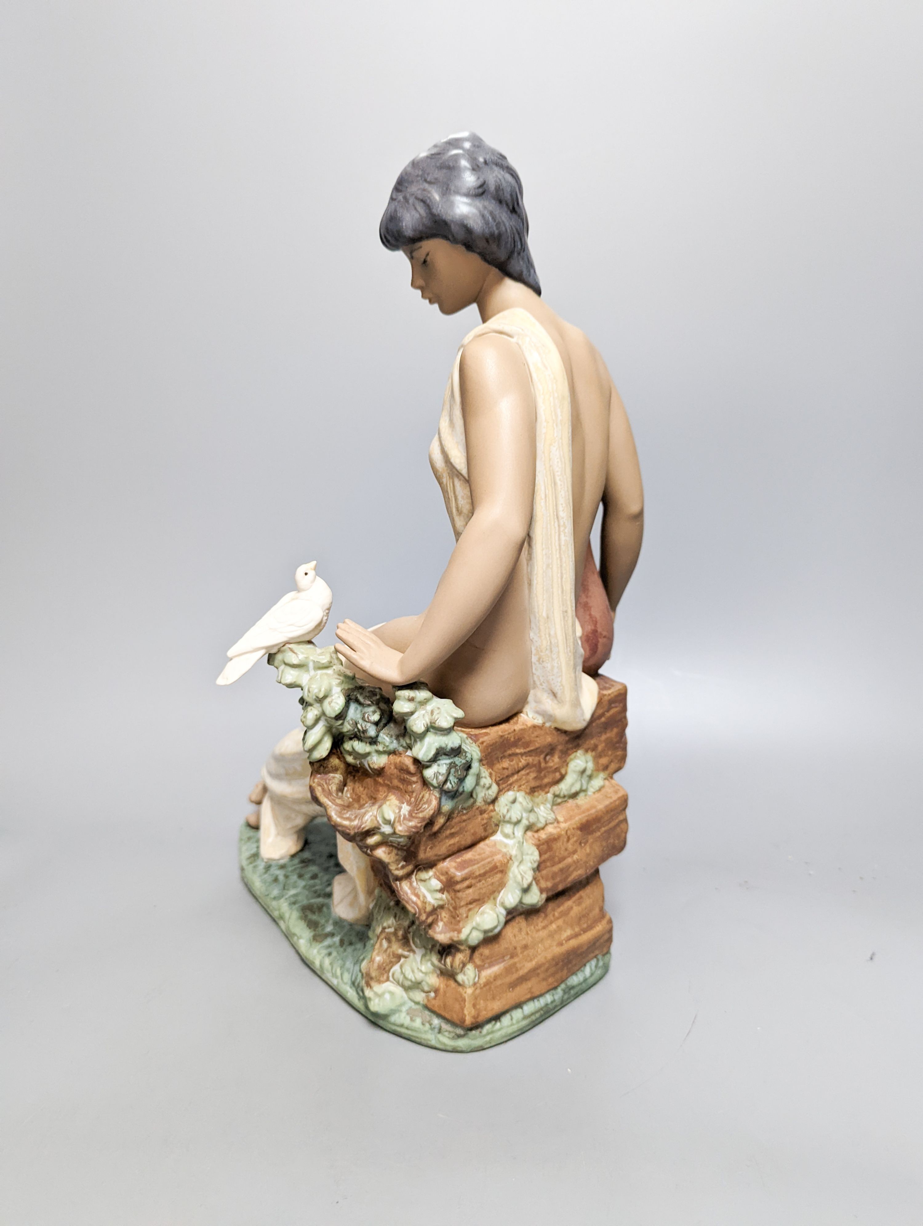 A Lladro stoneware figurine ‘Solitude’, Height 34cm. Width 25cm.